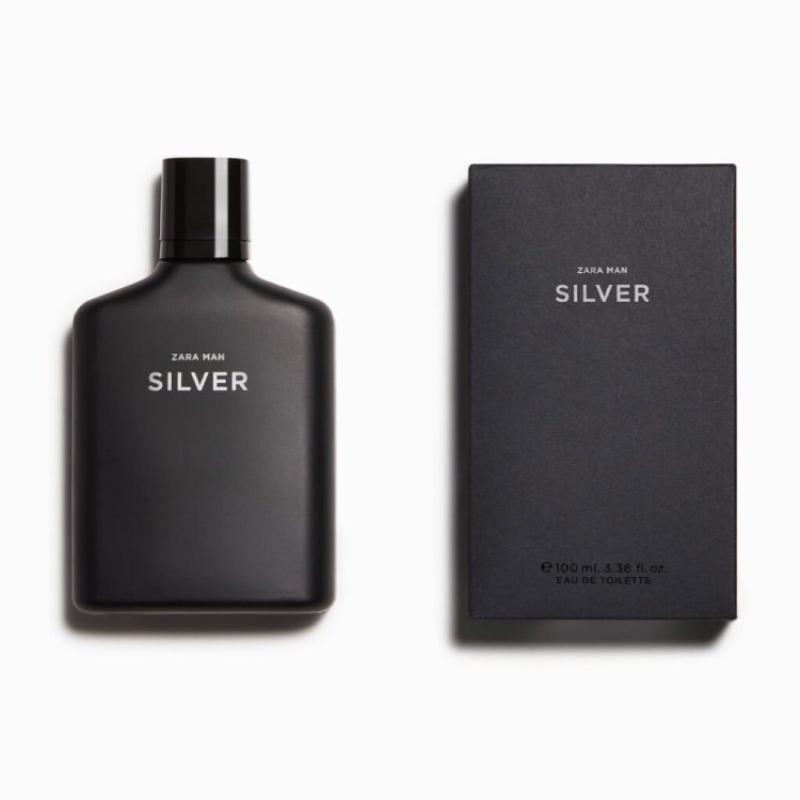 Hinh anh sap xep cac chai nuoc hoa Zara Emotions (Hop tac Jo Malone) voi bao bi toi gian, mau trang, dat canh mot canh hoa hoac la cay tao cam giac tinh te, sang trong. Tiep tuc voi tieu de "Zara Emotions - Khi Zara Ket Hop Cung Jo Malone".